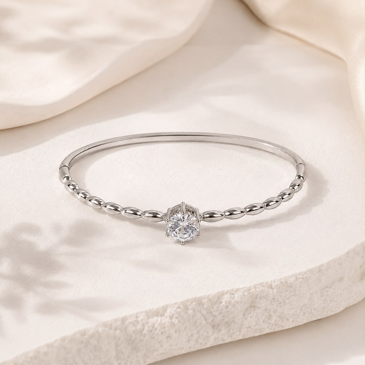 Silver Solitaire Twist Bangle