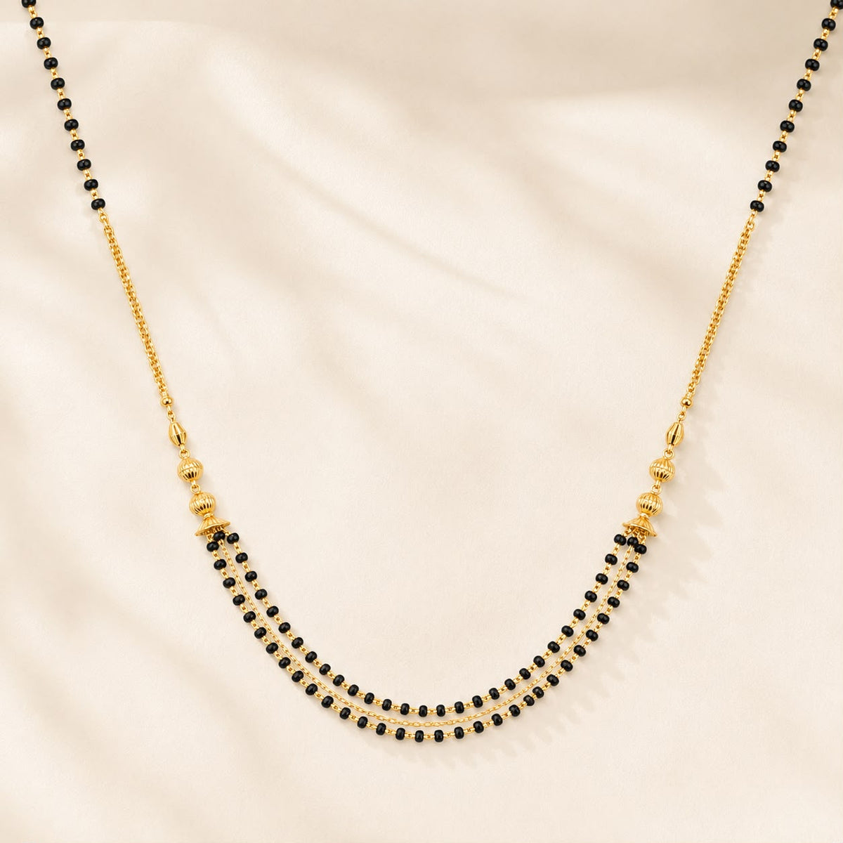 Golden Triple Black Bead Necklace