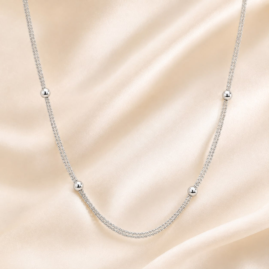 Silver Triple Strand Bead Necklace