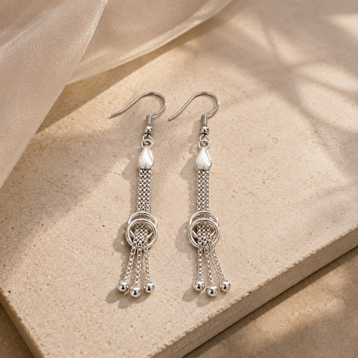 Interlocking Ring Chain Tassel Earrings